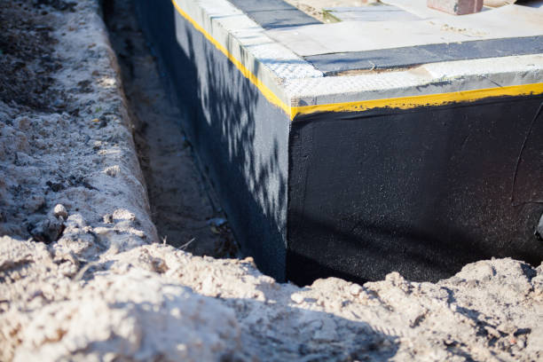 Professional Emergency Waterproofing technician working in Kensington, MD